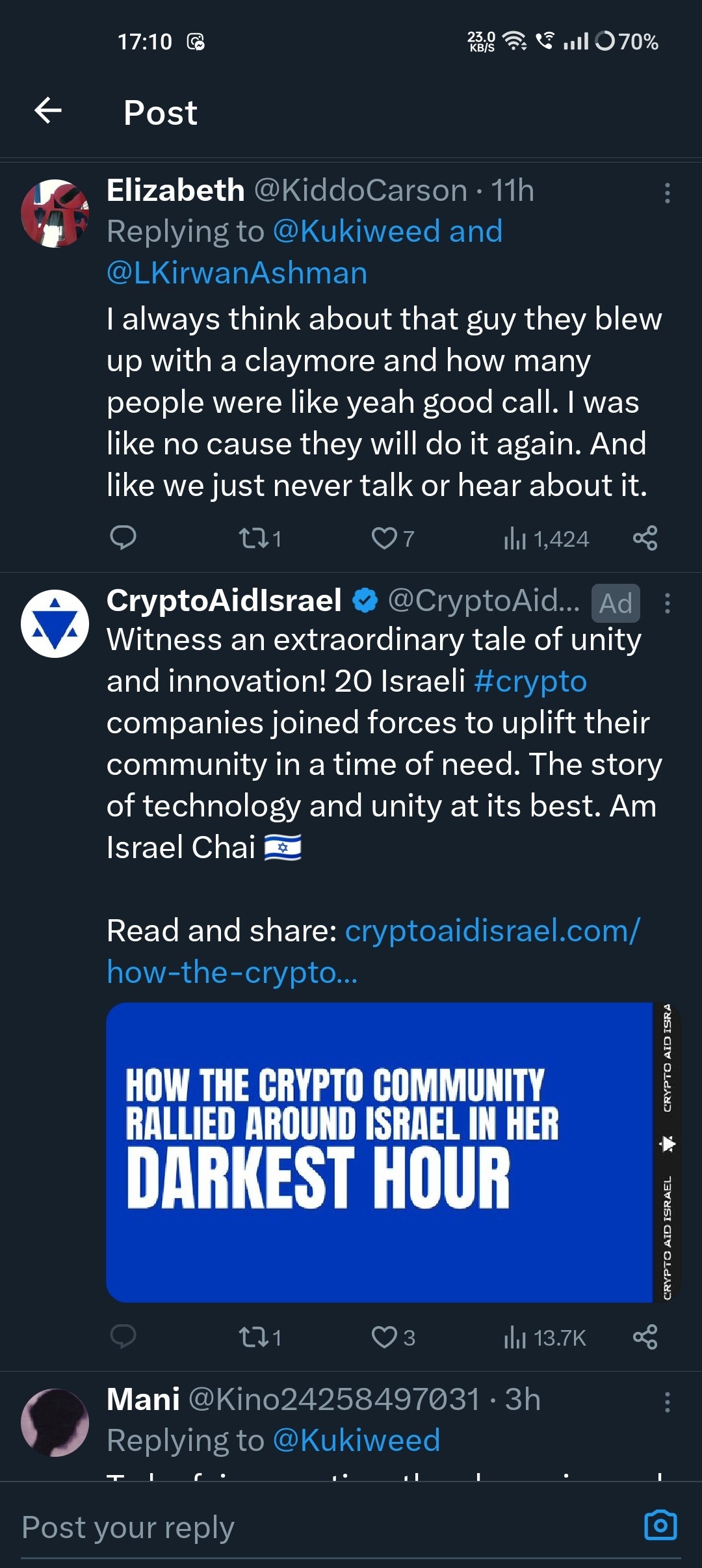 in the middle of some tweet replies, an ad by CryptoAidIsrael saying 